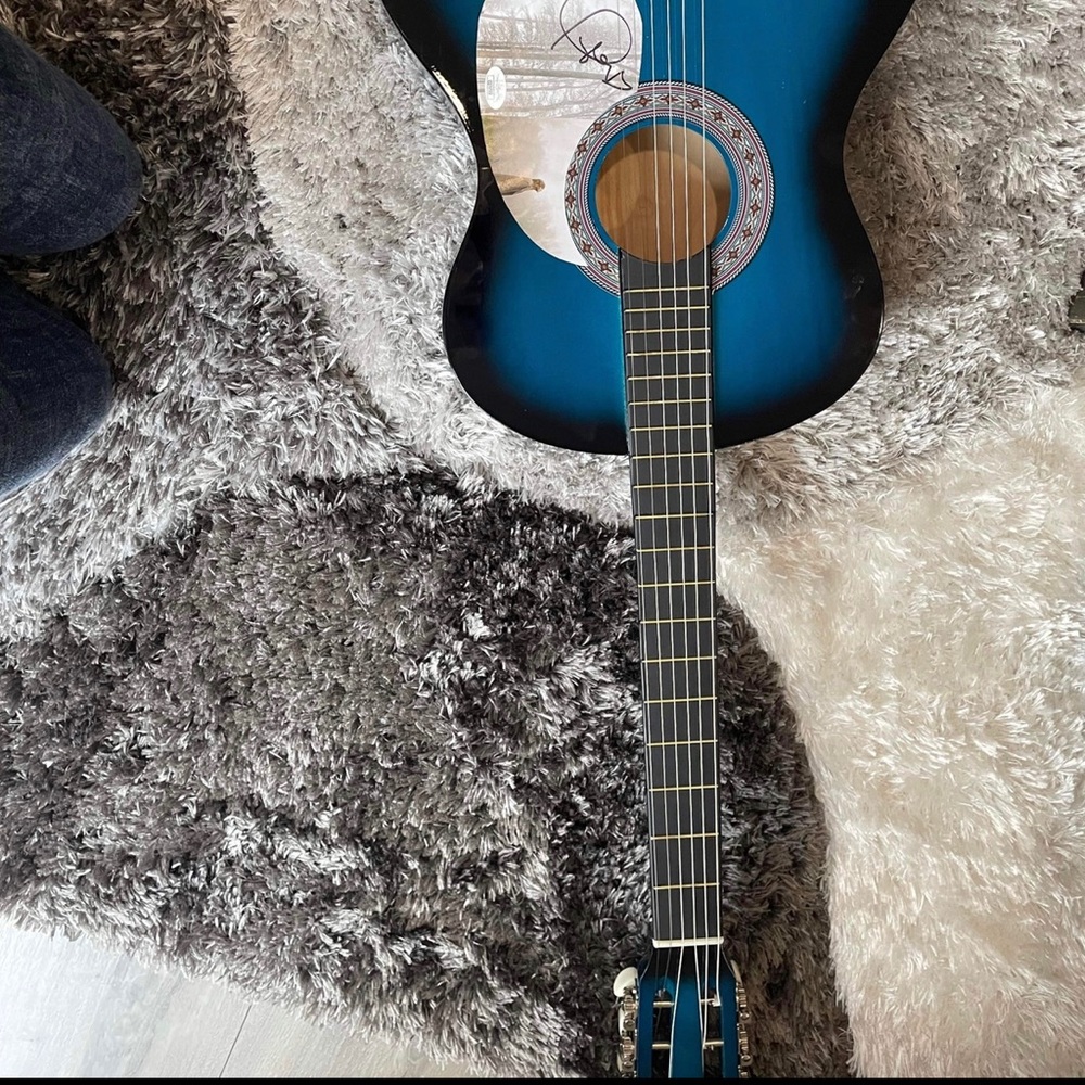 Guitar signed by Taylor Swift